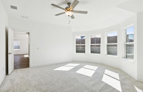 Elegant owner's suite with Bay window *real home pictured