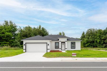 New construction Single-Family house 325 Marion Oaks Trail, Ocala, FL 34473 - photo 0