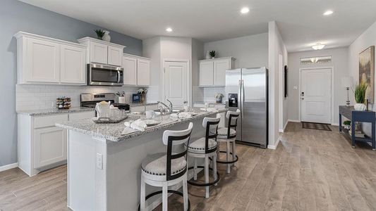 Kitchen - All Home and community information, including pricing, included features, terms, availability and amenities, are subject to change at any time without notice or obligation. All Drawings, pictures, photographs, video, square footages, floor plans, elevations, features, colors and sizes are approximate for illustration purposes only and will vary from the homes as built.