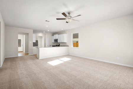 Large living room will accommodate various sizes of furniture.