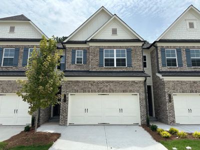 New construction Townhouse house 1595 Gin Blossom Circle, Lawrenceville, GA 30045 Davenport- photo 0