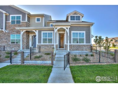 New construction Townhouse house 5116 River Roads Dr, Timnath, CO 80547 - photo 0