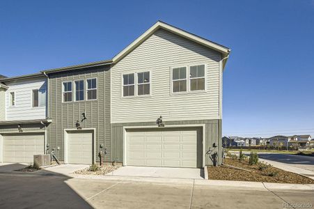 New construction Townhouse house 5523 Euclid Court, Timnath, CO 80547 - photo 0