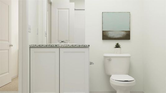 Bathroom with vanity and toilet