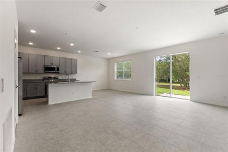 New construction Single-Family house 2038 Firethorn Loop, Haines City, FL 33844 - photo 3 3