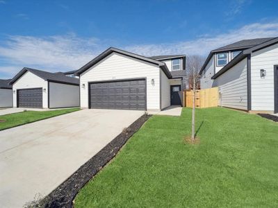 View of front facade with a front yard