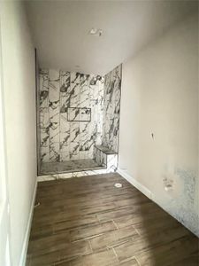 Unfurnished room with hardwood / wood-style floors