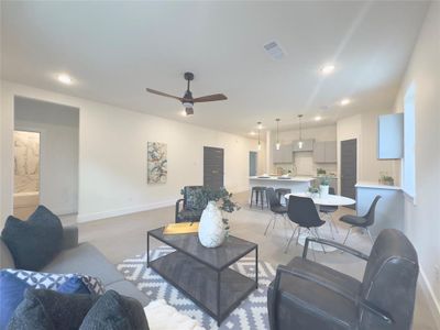 Living room with sink and ceiling fan