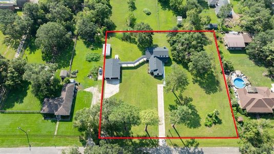 Peaceful And Tranquil Setting. Aerial view of this luxury estate with renovated home including upscale features and finishes; the detached 4-car garage offers ~700-sq feet of climate controlled space - great for a home-office or small business.