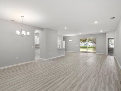 Your new home includes a spacious and open living area finished with luxury vinyl plank flooring.