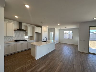 Lot 340 - Kitchen & Dining Area | Pastora | Sunrise Peak Series | New homes in Surprise, AZ | Landsea Homes