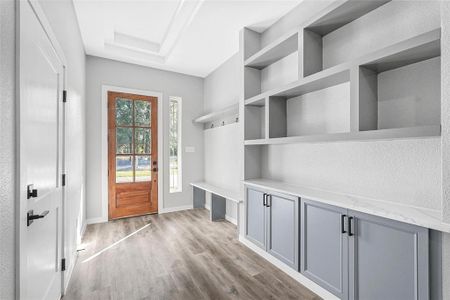 Mudroom featuring light hardwood / wood-style floors