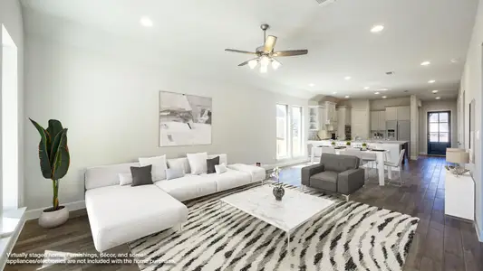 Living room featuring baseboards, recessed lighting, dark wood-style flooring, and ceiling fan