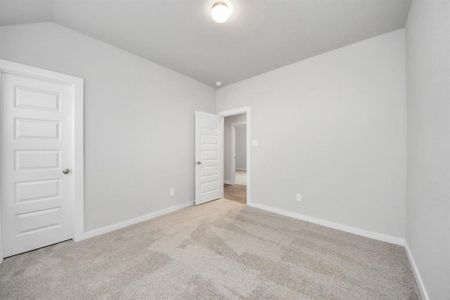 Generously sized secondary bedrooms featuring spacious closets, soft and inviting carpeting underfoot, large windows allowing plenty of natural light, and the added touch of privacy blinds for your personal retreat.