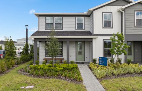 New construction Townhouse house 6456 Mossy Wood Ave, Orlando, FL 32829 - photo 0