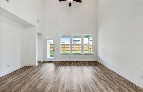 Airy gathering room with tall ceilings and large windows *real home pictured