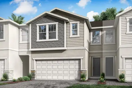 New construction Townhouse house 31490 Woodland Race Lp, Wesley Chapel, FL 33545 Sebring- photo 0