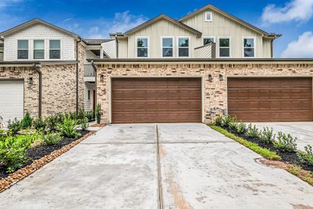 New construction Townhouse house 14833 Spica Court, Willis, TX 77318 - photo 0