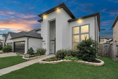 This home has stunning stucco, meticulously manicured lawn, beautiful flower beds gives this house a wounderful looks.