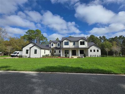 New construction Single-Family house 405 Long And Winding Rd, Howey-in-the-Hills, FL 34737 - image 13