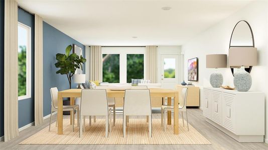 Dining space featuring a wealth of natural light and light hardwood / wood-style floors