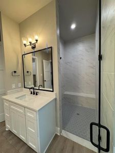 Primary Shower Sneak Peek, Notice the Bench and Marble