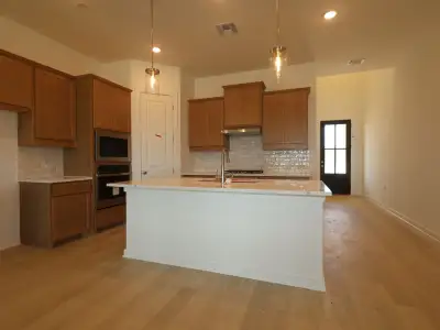 New construction Single-Family house 135 Pinky Varner Ct, Buda, TX 78610 plan Belmont II - Signature II Series - image
