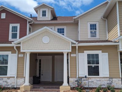 New construction Townhouse house 7591 Sunflower Circle, Kissimmee, FL 34747 - photo 0