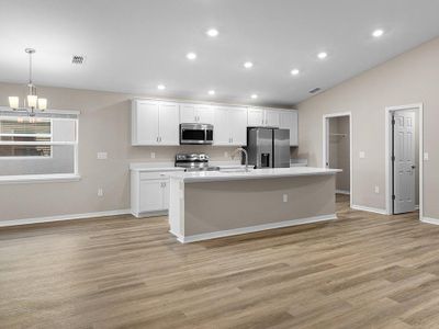 Inside, you`ll find beautiful finishes including LVP flooring, quartz countertops, and 36-inch cabinets.