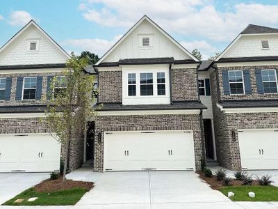 New construction Townhouse house 1591 Gin Blossom Circle, Lawrenceville, GA 30045 Davenport- photo 0