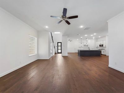 The beautiful open concept of the Warwick floorplan! The living room transitions between the kitchen, breakfast room and dining room. (Sample photos of a completed Warwick floor plan. The image may feature alternative selections and/or upgrades.)