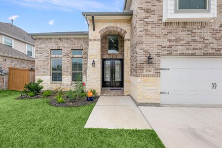 A well-manicured lawn and stunning landscaping