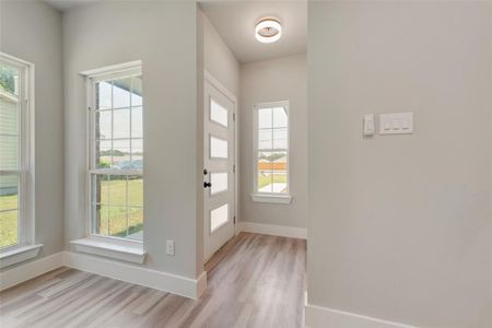 Entryway featuring light wood-type flooring