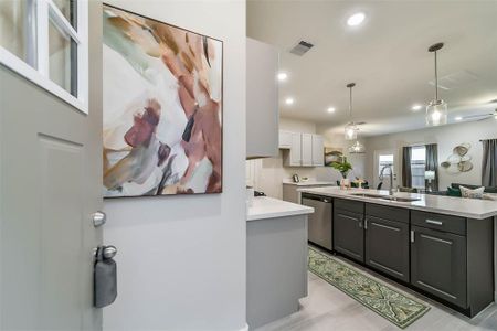 PHOTOS OF A STAGED HOUSE - SAME FLOOR PLAN AND SAME FINISHES