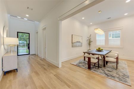 Formal Dining with beautiful chandelier. Plantation Window Shutter in every room.