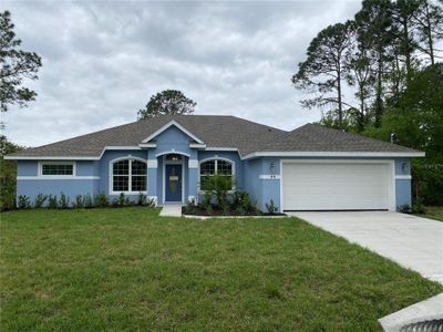 New construction Single-Family house 99 Sloganeer Trail, Palm Coast, FL 32164 - photo 0