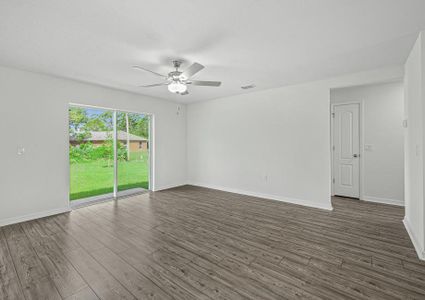 The family room is spacious and opens up easily to the dining room