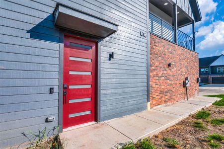 Doorway to property with a balcony