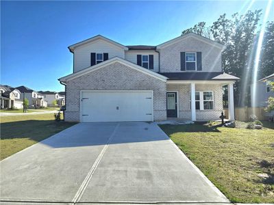 New construction Single-Family house 4348 Dean Grove Way, Loganville, GA 30052 - photo 0