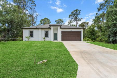 New construction Single-Family house 836 Clow St E, Lehigh Acres, FL 33974 - image
