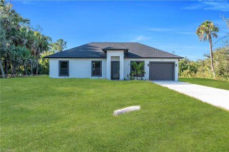 New construction Single-Family house 644 Woodcrest Dr, Lehigh Acres, FL 33972 - image