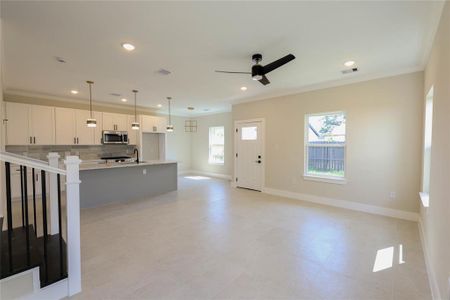 Open living area w/ Kitchen & Dining area makes for a great entertainment layout.