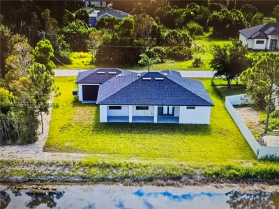 New construction Single-Family house 728 N Laplata Ave, Lehigh Acres, FL 33974 - image