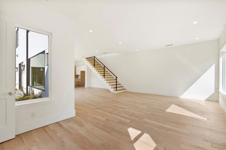 Unfurnished living room featuring light hardwood / wood-style floors