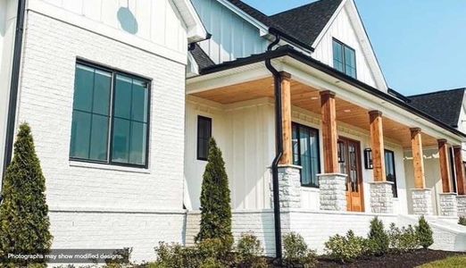 View of property exterior with a porch