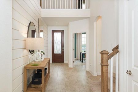 Photo of Pulte model home with same floor plan, not of actual home listed.