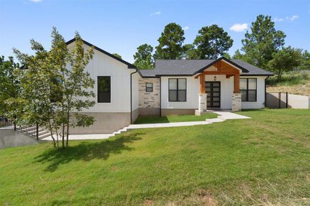 New construction Single-Family house 144 Honopu Dr, Bastrop, TX 78602 - photo 0