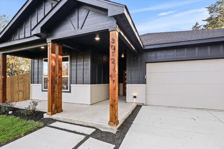 View of front of property with a garage