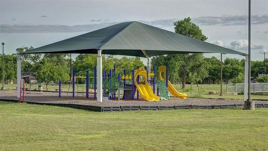 View of playground with a yard