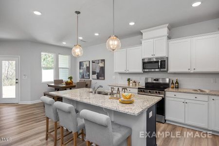 New construction Townhouse house 3928 Well Fleet Dr, Willow Spring, NC 27592 The Graham Exterior- photo 6 6